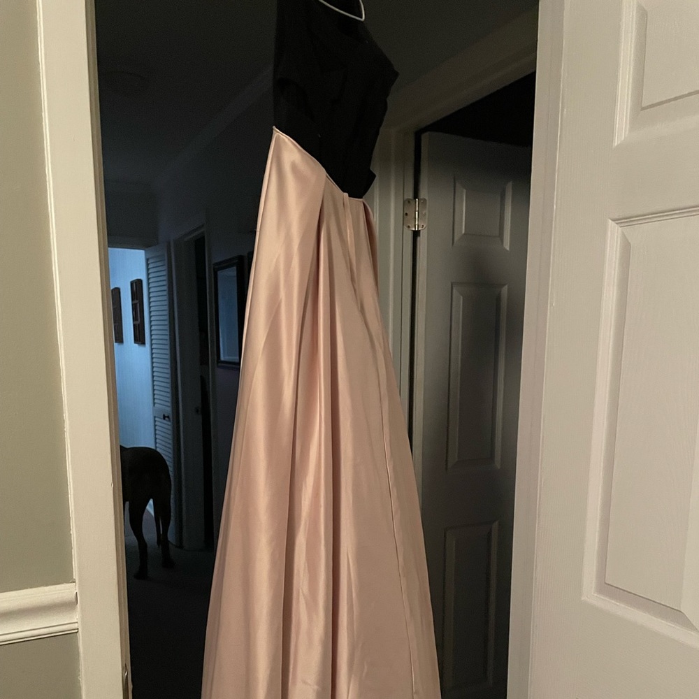 Simple elegant prom dress, strapless with side cutouts.
